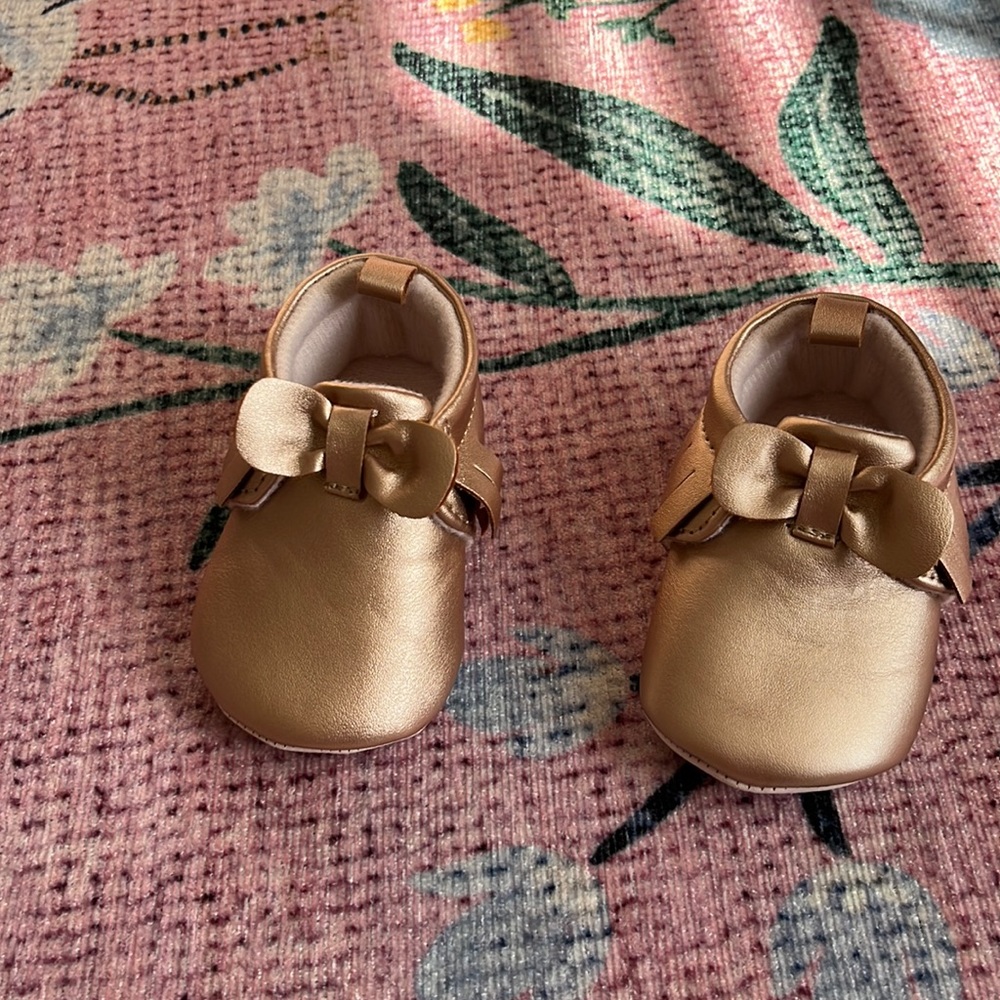 Rose gold baby moccasin